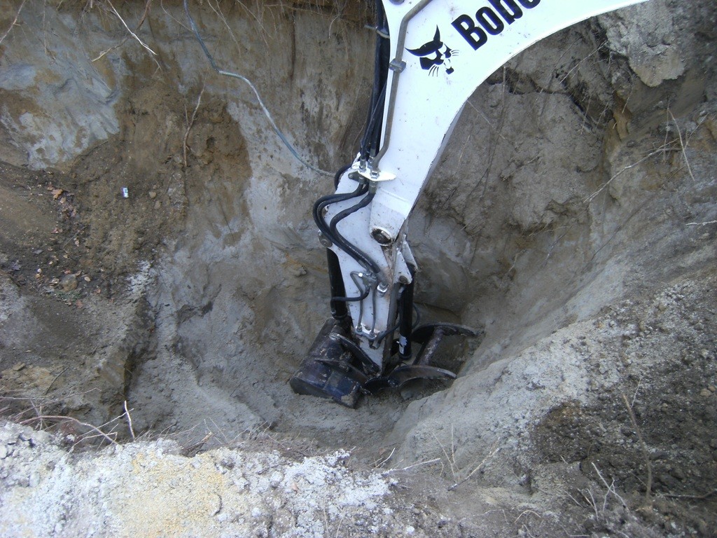 Excavation equipment at a tank management project