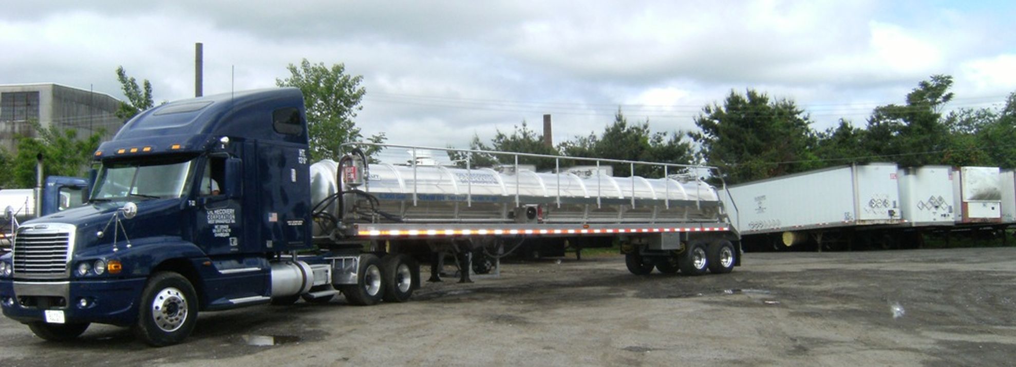 Oil Recovery Corporation vacuum tanker and trailers at the company yard